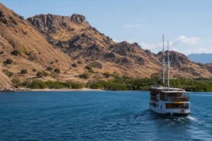 Phinisi boat approaching Komodo Island in Komodo National Park