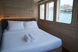 Double bed in the Larantuka and Wae Rebo cabin category aboard Mosalaki