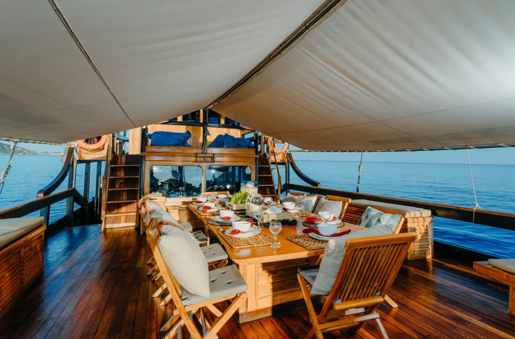 Adishree sundeck outdoor dining 02 aboard Adishree phinisi