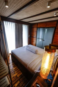 Side view of an Arun upper-deck cabin aboard Amaya Explorer