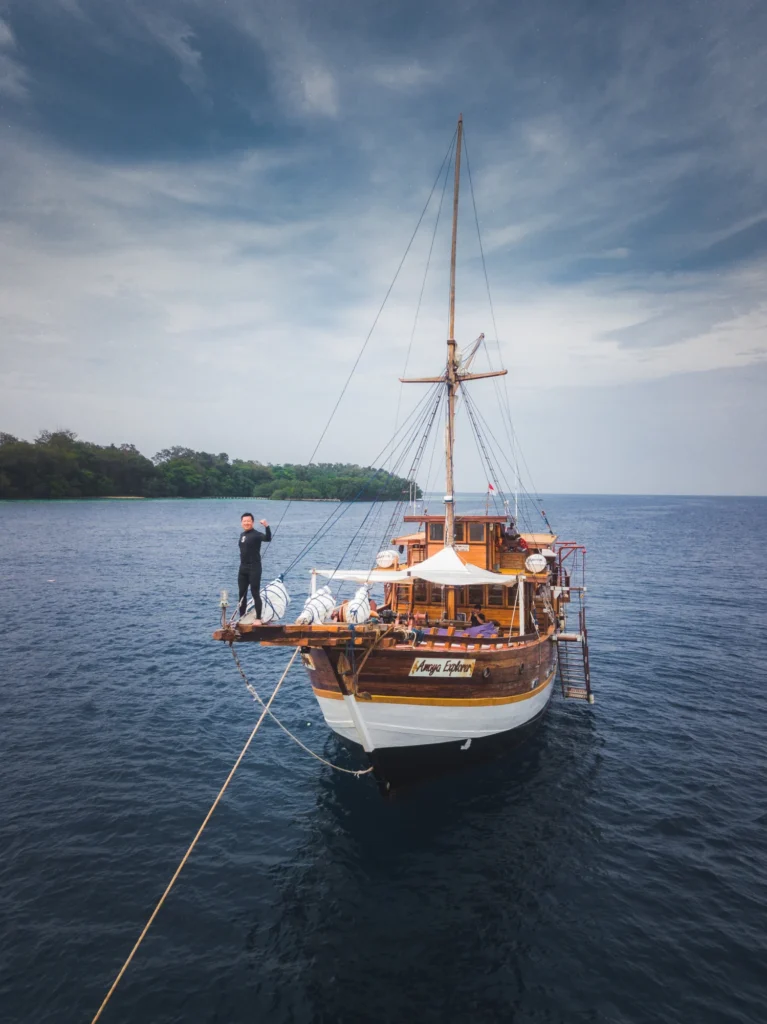 Aerial view of the Amaya Explorer phinisi at anchor