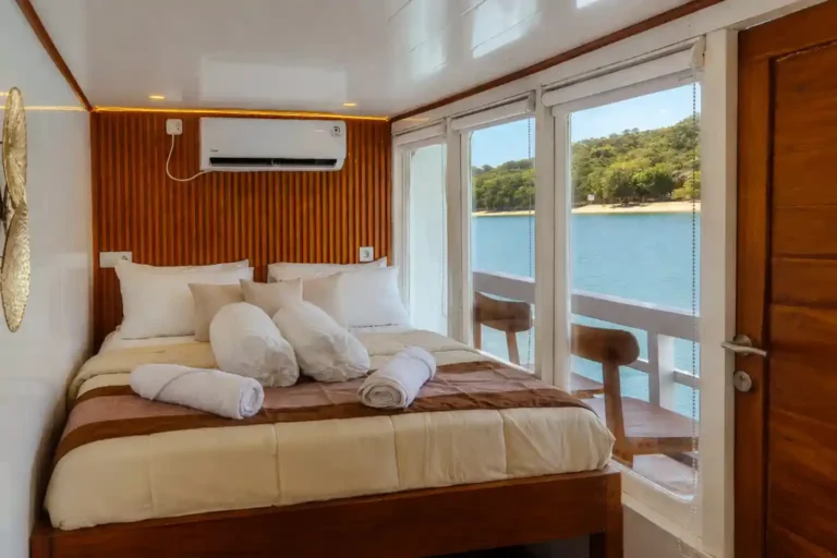 Master grade cabin on Chrisbow Azure with a double bed and ocean view