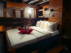 Solid wood cabin interior on Jakare with storage and individually controlled air conditioning