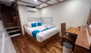 Suite Ocean View bedroom aboard Lady Grace