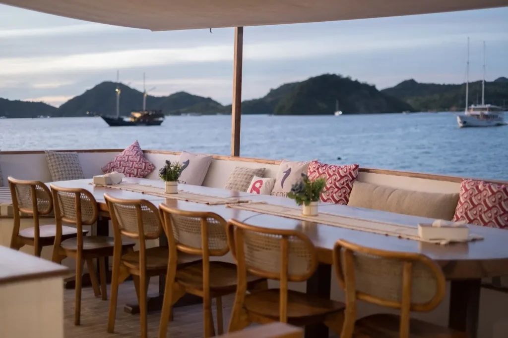 Outdoor dining area aboard Le Costa