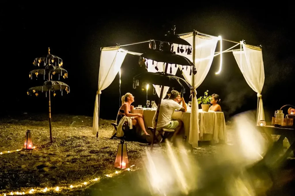 Beach dining set-up by the Magia II crew