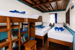 Deluxe cabin aboard Mari arranged with twin beds