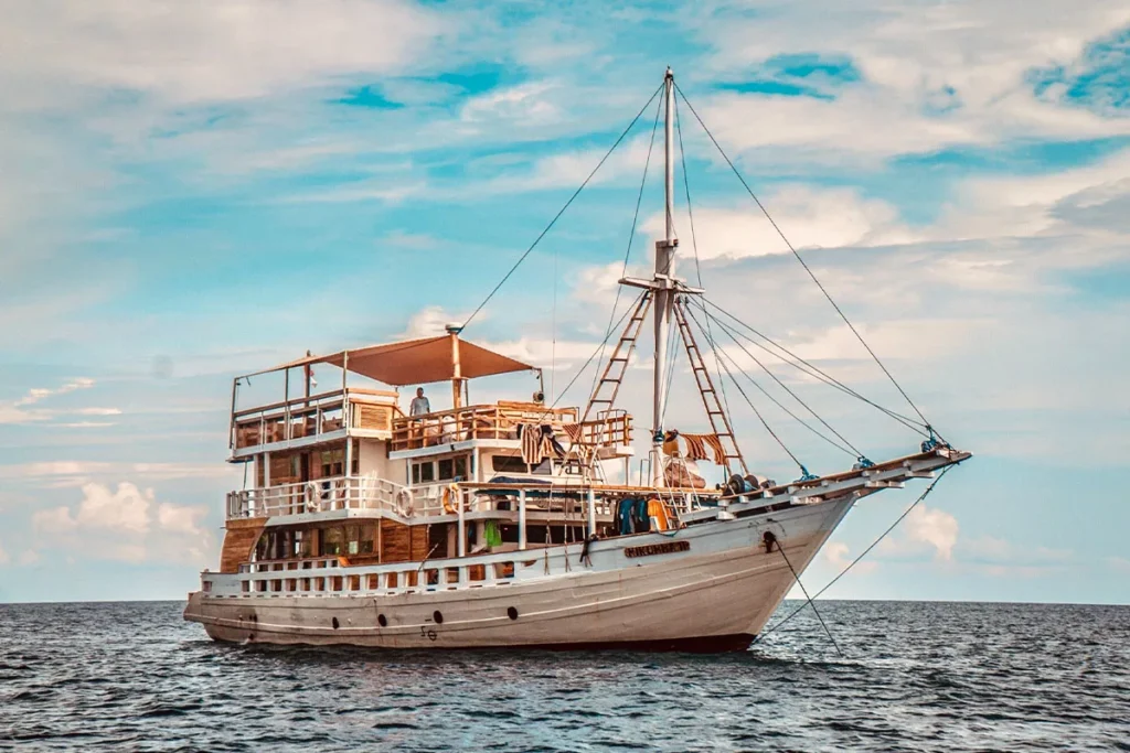 Port exterior of Mikumba Dua under way