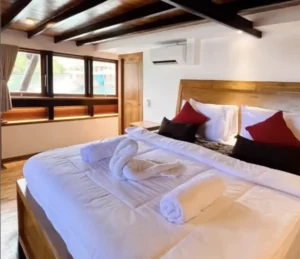 Suite Cabin on the main deck of Panrita with a king bed plus a single
