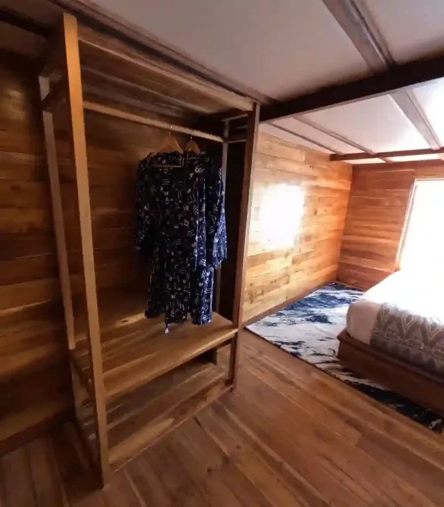 Borneo upper-deck cabin on Raffles Cruise with a queen bed and ensuite bathroom