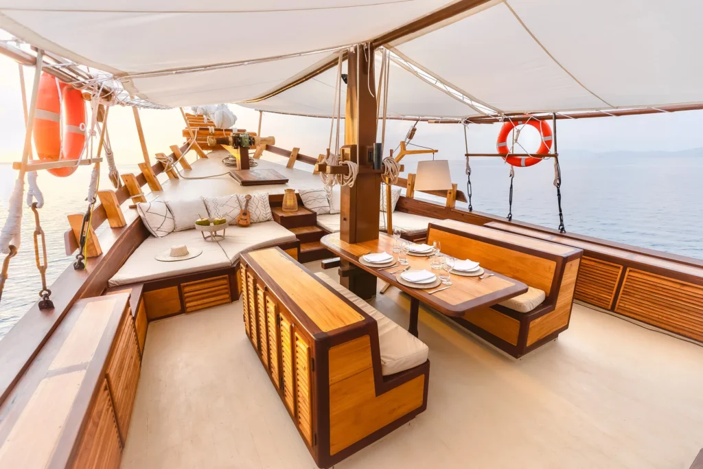 Foredeck dining and lounging area aboard Senja