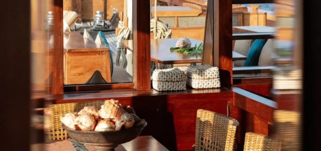 Air-conditioned indoor dining lounge aboard Si Datu Bua