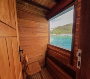Sundari deluxe balcony cabin balcony aboard Sundari Voyages phinisi