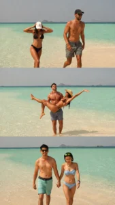 Couple having fun and posing on the white sands of Taka Makassar sandbar during their 4 days 3 nights Komodo boat expedition.
