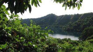 Crater lake surrounded by forest on Satonda Island