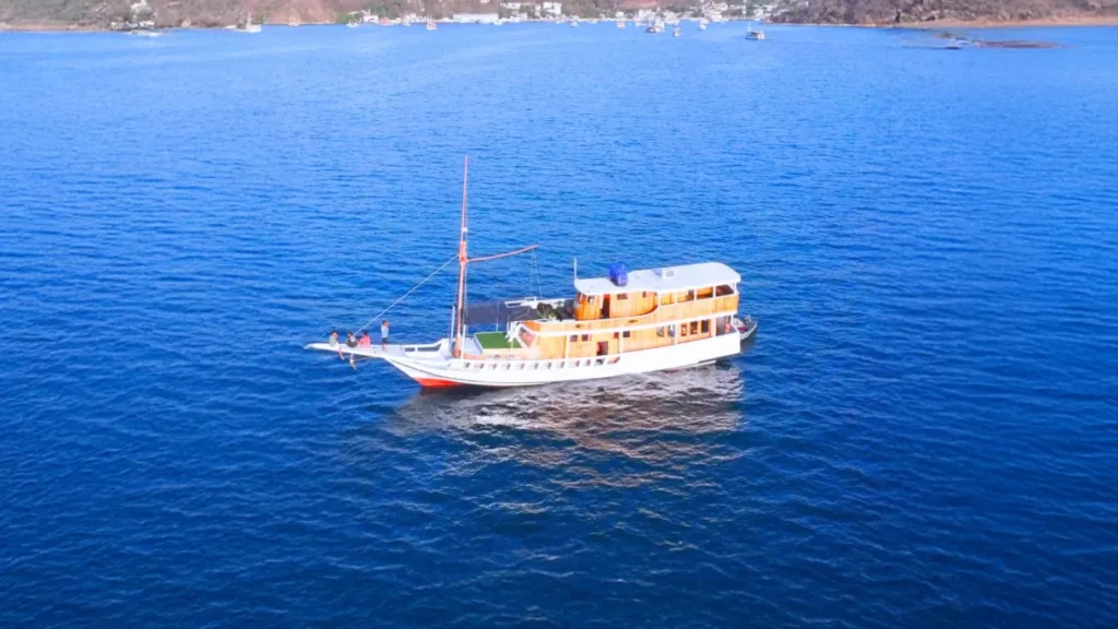 Aerial side view of Diara La Oceano Phinisi on blue water