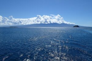 Mount Rinjani seen from a ferry crossing Alas Strait between Lombok and Sumbawa