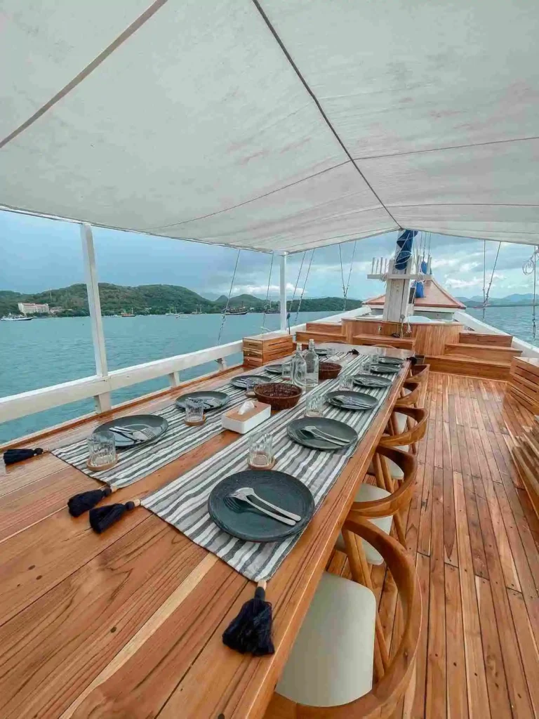 Prepared dining table aboard Soe Besar Vanrei